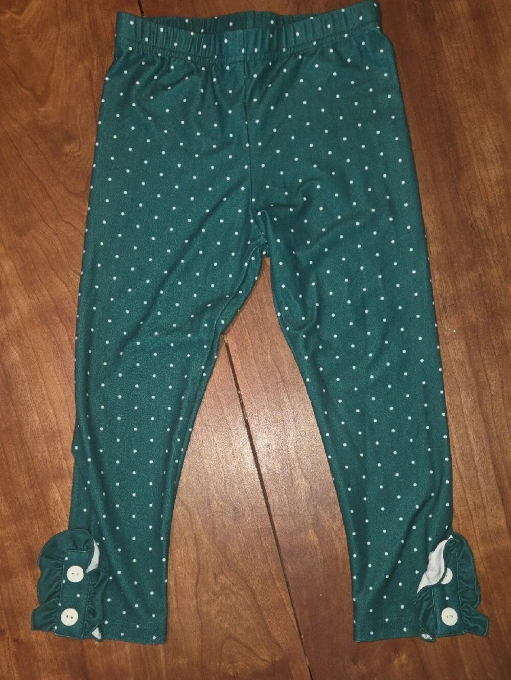Girls Green Santa Print Pajama Set with Ruffle Top and Polka Dot Leggings